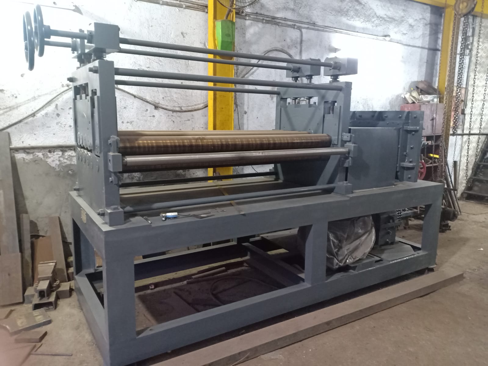 Straightening Machine - Industrial coil processing equipment manufactured by Friend Engineering Works